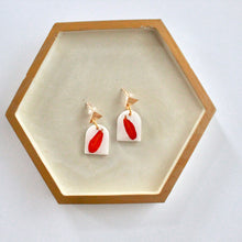 Load image into Gallery viewer, Orange Flower Petal Dangle Earrings
